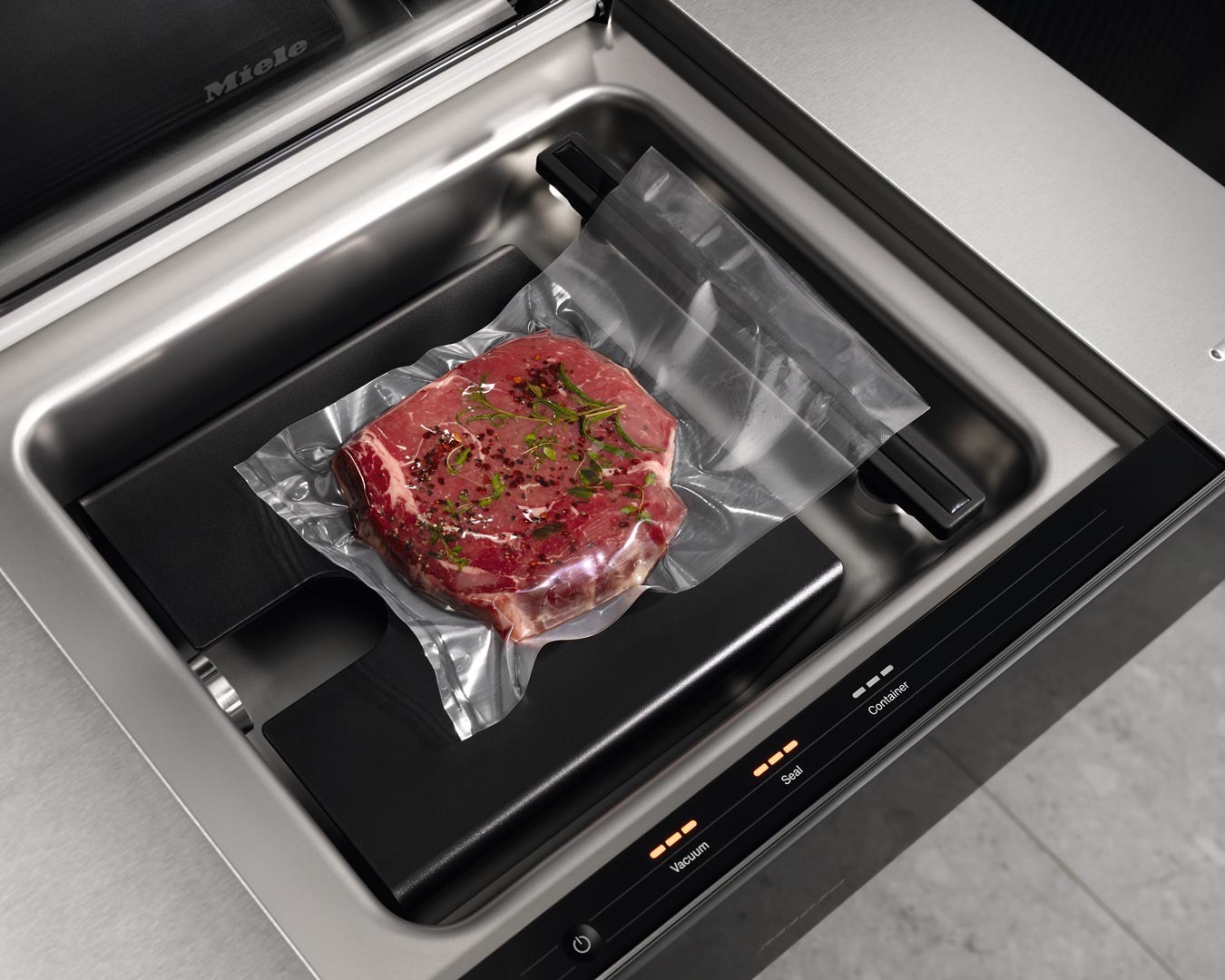 Carne envasada al vacío en la gaveta de Miele
