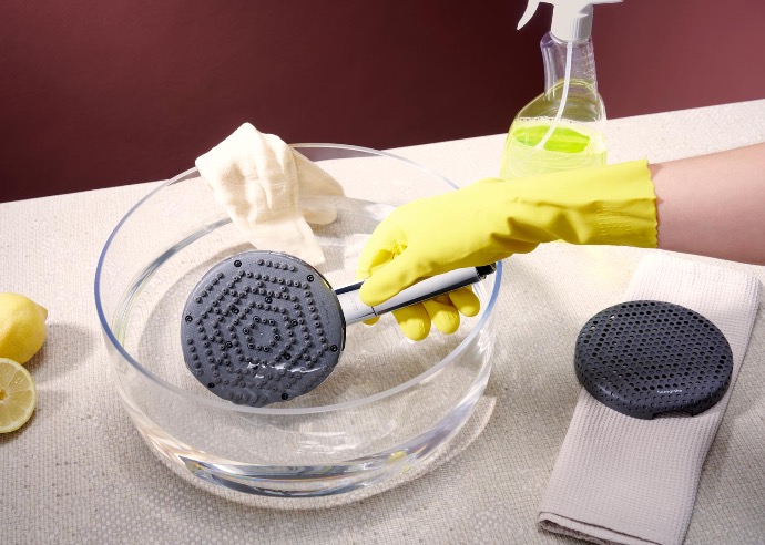 Servicio de Limpieza Limpieza de una ducha de mano